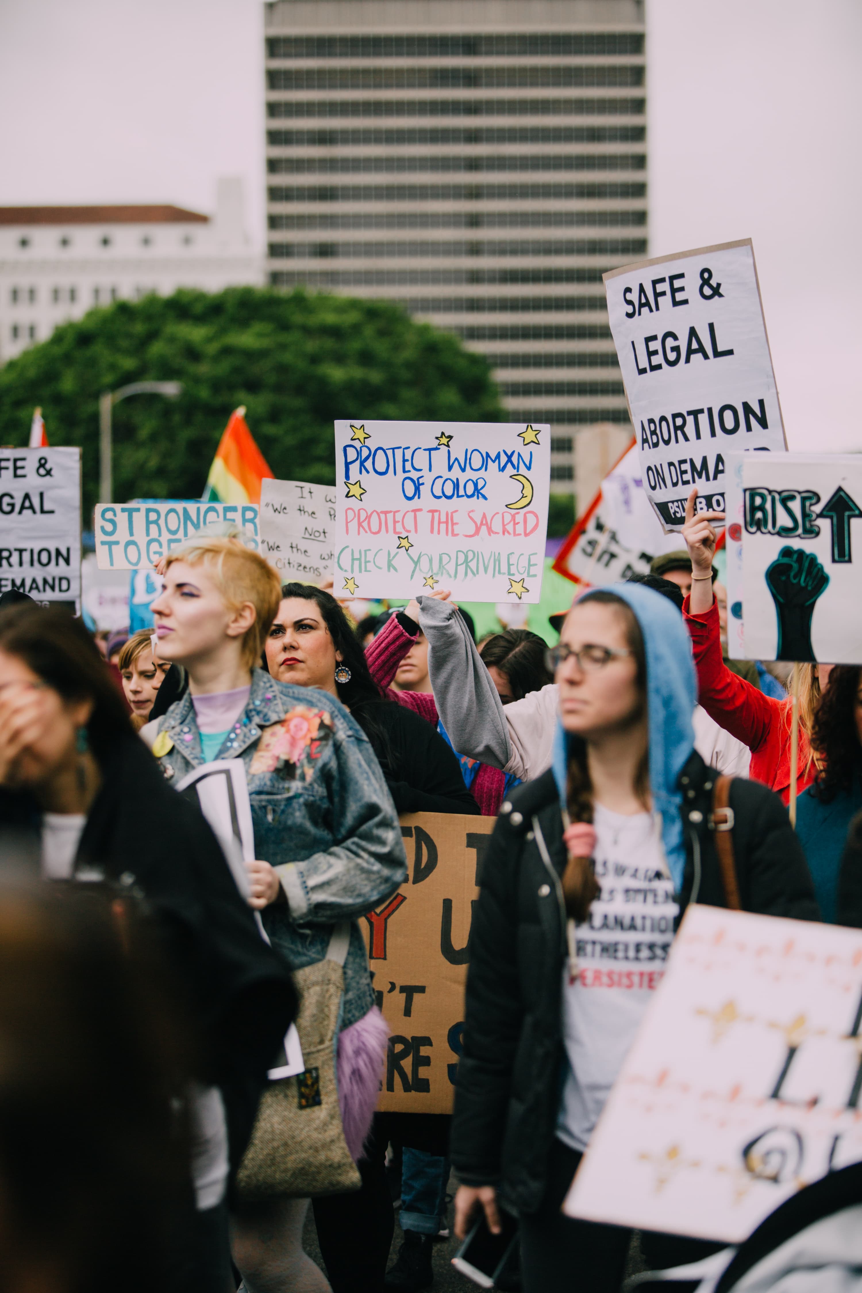 Participants marching during an International Women’s Day event